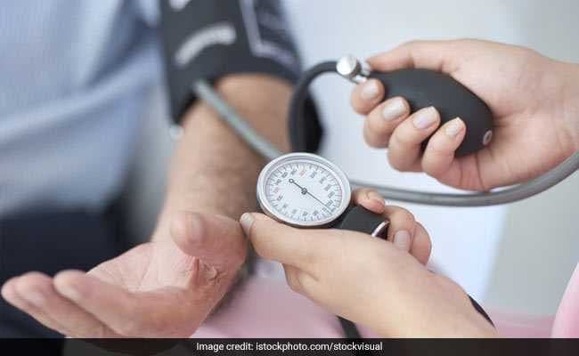 NDTV article image: blood pressure being measured, used with Dr. Godbole's World Hypertension Day feature